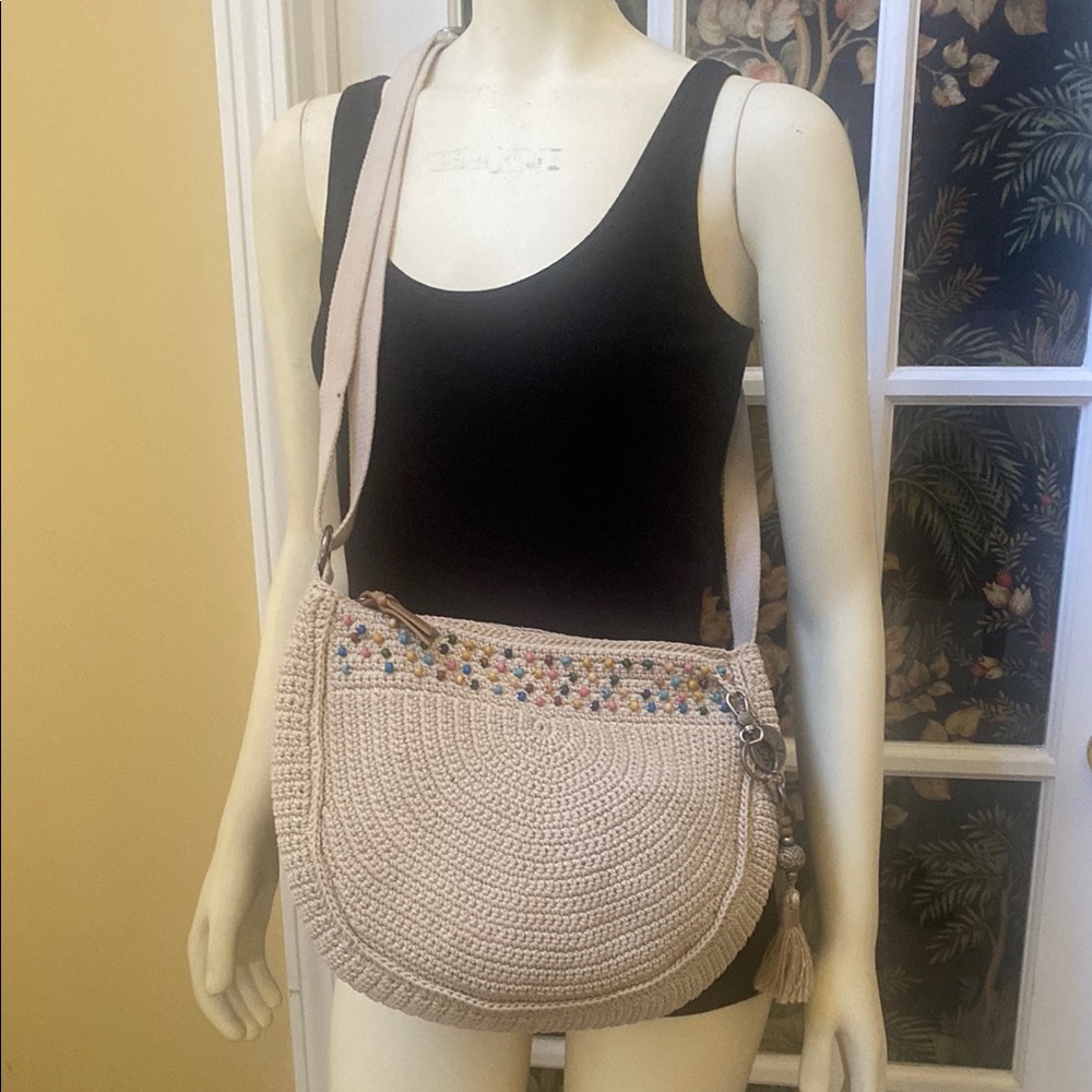 The Sak boho crochet texture multi beaded shoulder or crossbody bag.